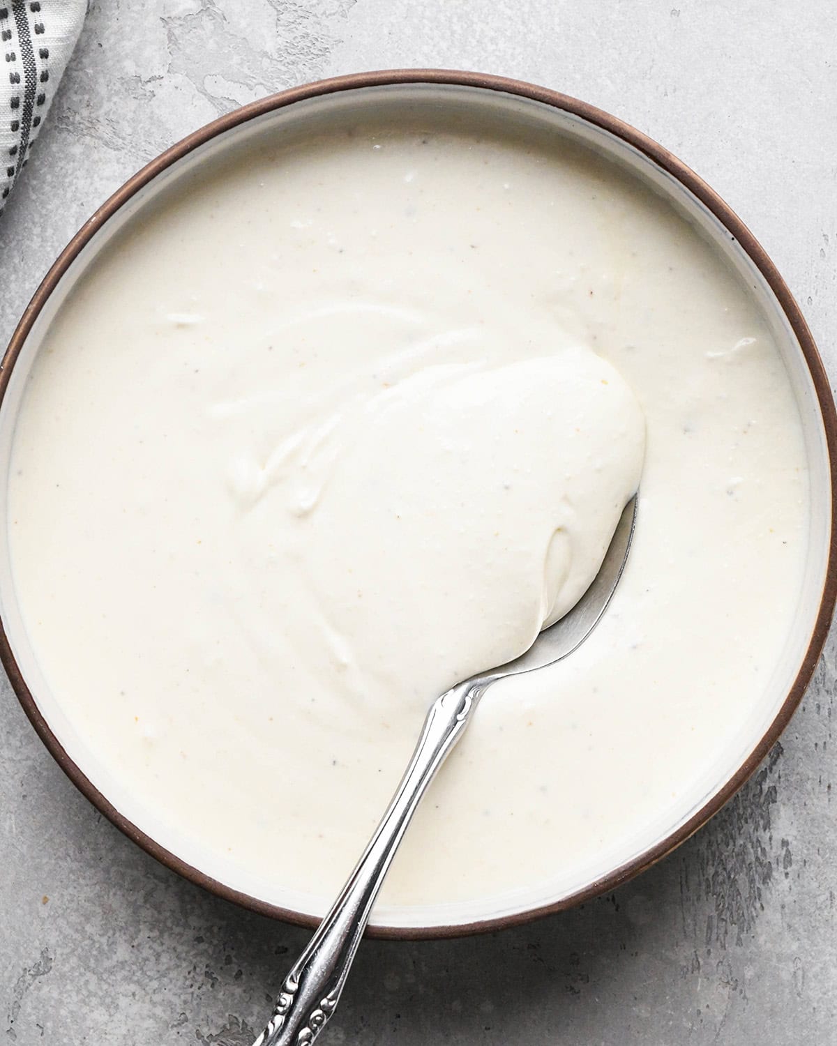 Whipped Goat Cheese Dip in a bowl before chilling