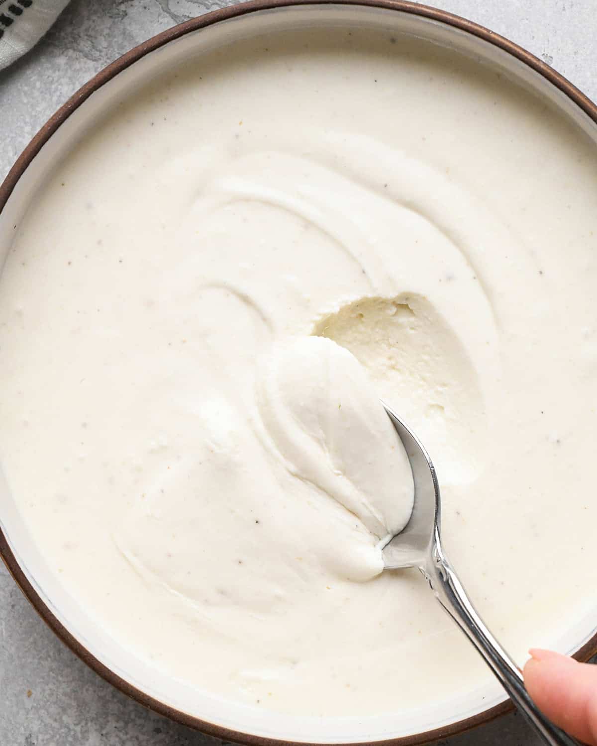 Whipped Goat Cheese Dip in a bowl after chilling