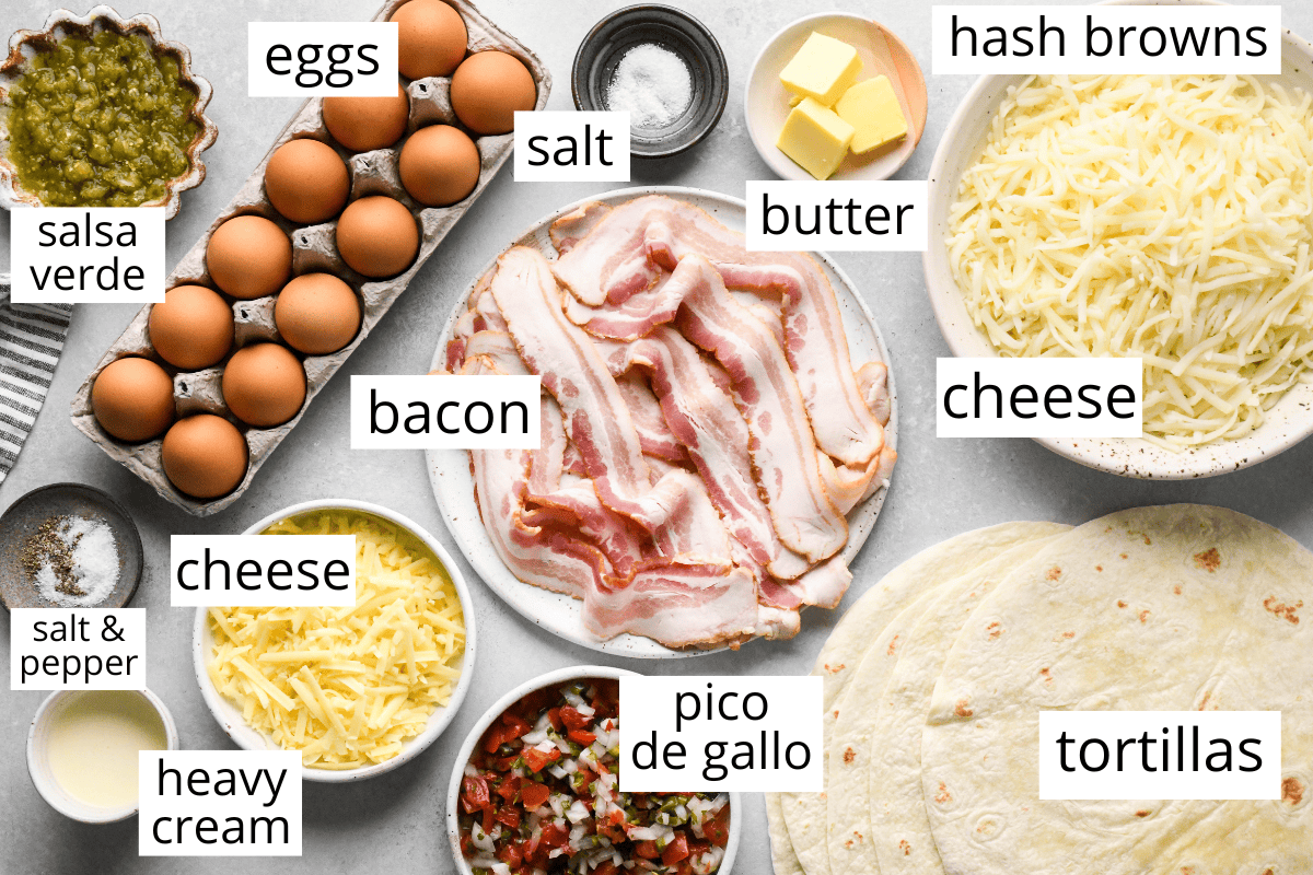 overhead photo of the labeled ingredients in this Breakfast Burritos recipe like tortillas, eggs, bacon, cheese and pico de gallo