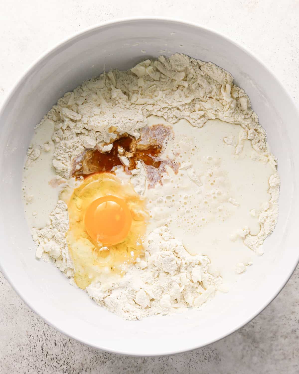 how to make cherry scones -milk, vanilla and egg added to the dry ingredient mixture before mixing
