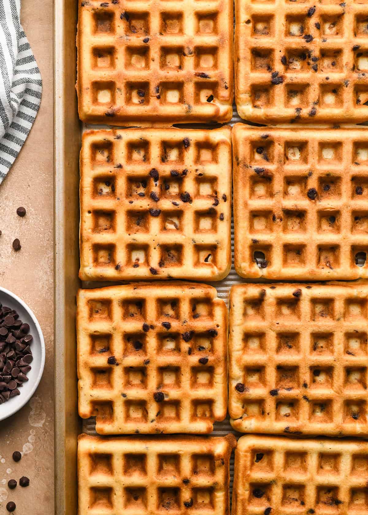 8 Chocolate Chip Waffles on a baking sheet