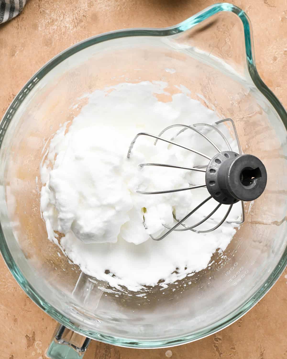 making chocolate chip waffles - beaten egg whites in a mixing bowl