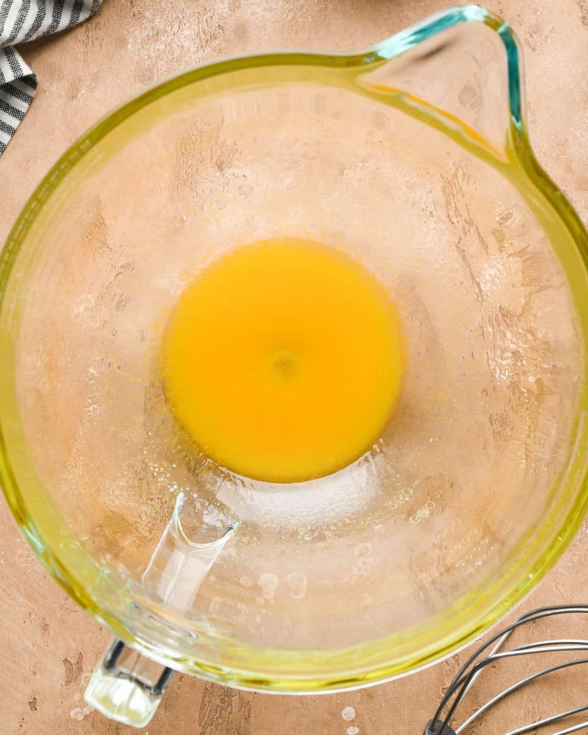 making chocolate chip waffles - butter and egg yolk mixed in a bowl