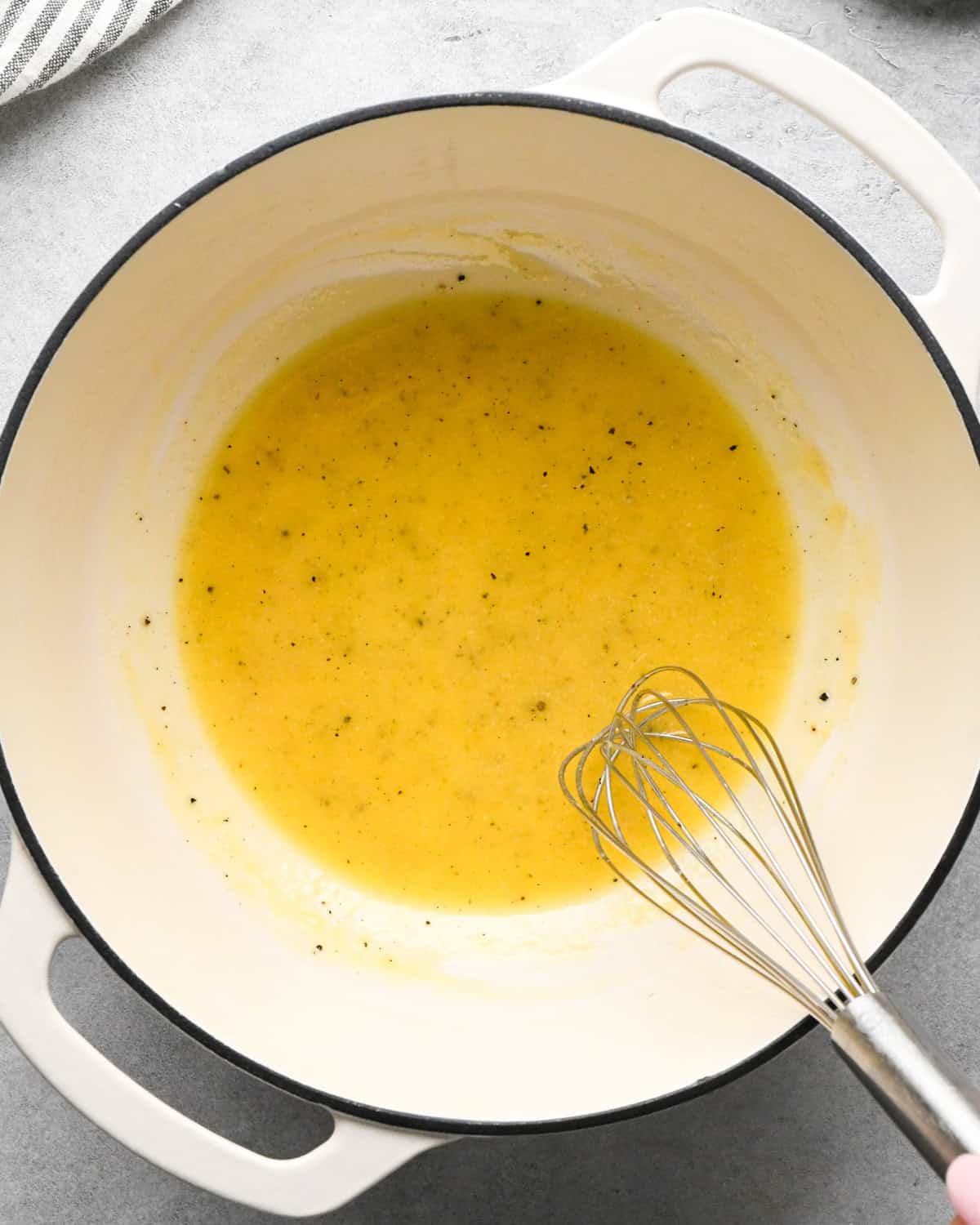 flour, salt and pepper whisked into  the melted butter in a white saucepan making cottage cheese mac and cheese