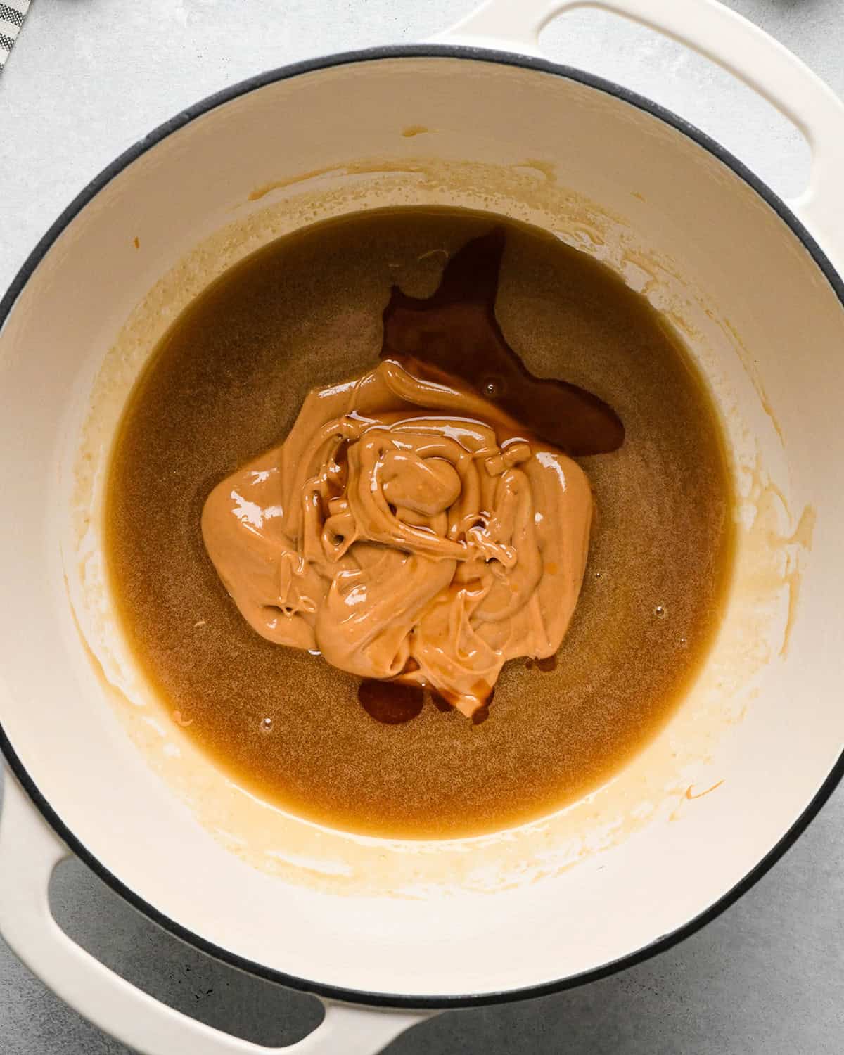 making Peanut Butter Granola Bars - peanut butter and vanilla added to butter mixture