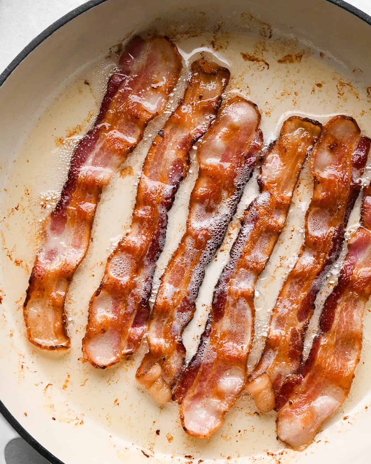 cooked bacon in a skillet
