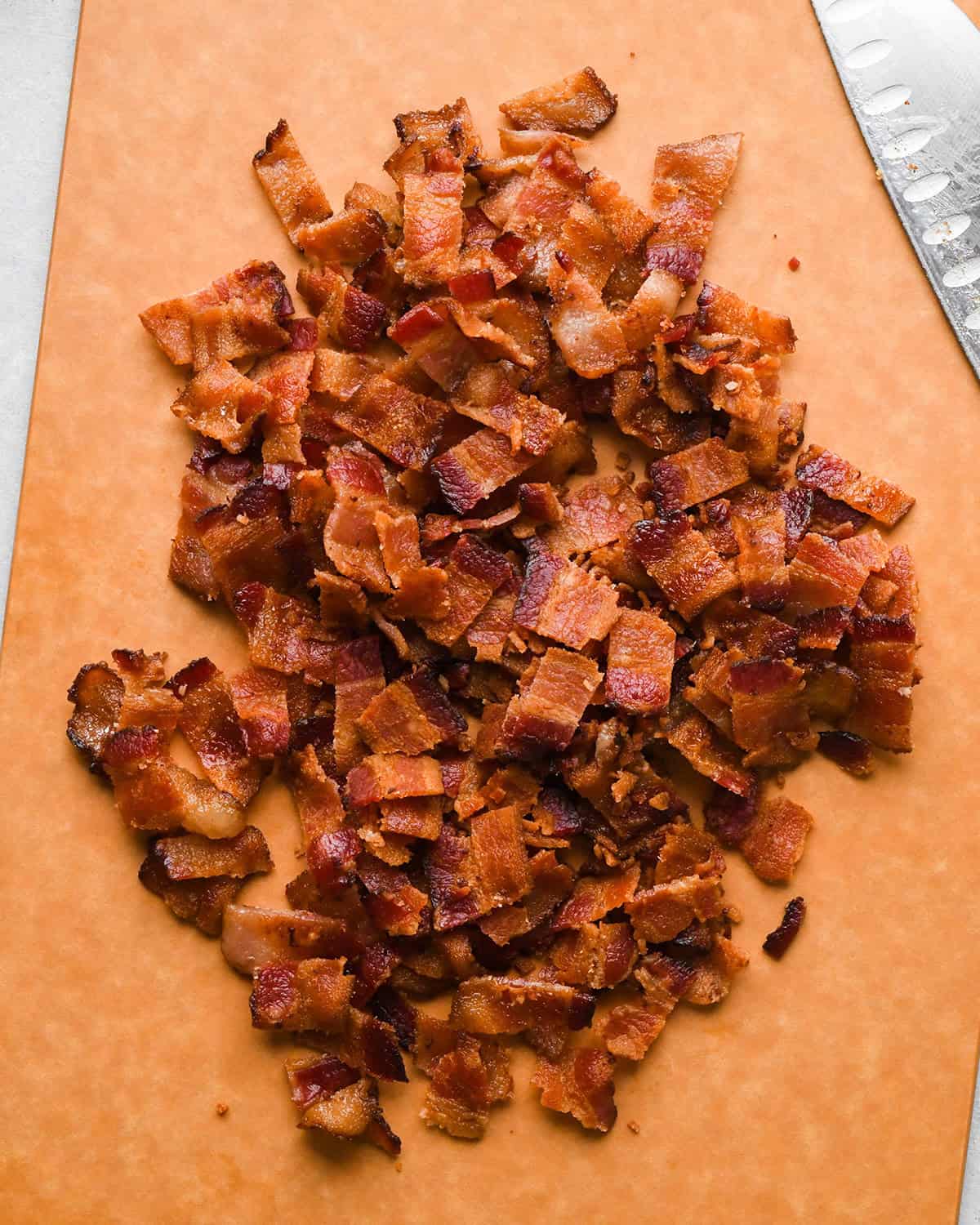How to Make Breakfast Burritos - diced bacon on a cutting board