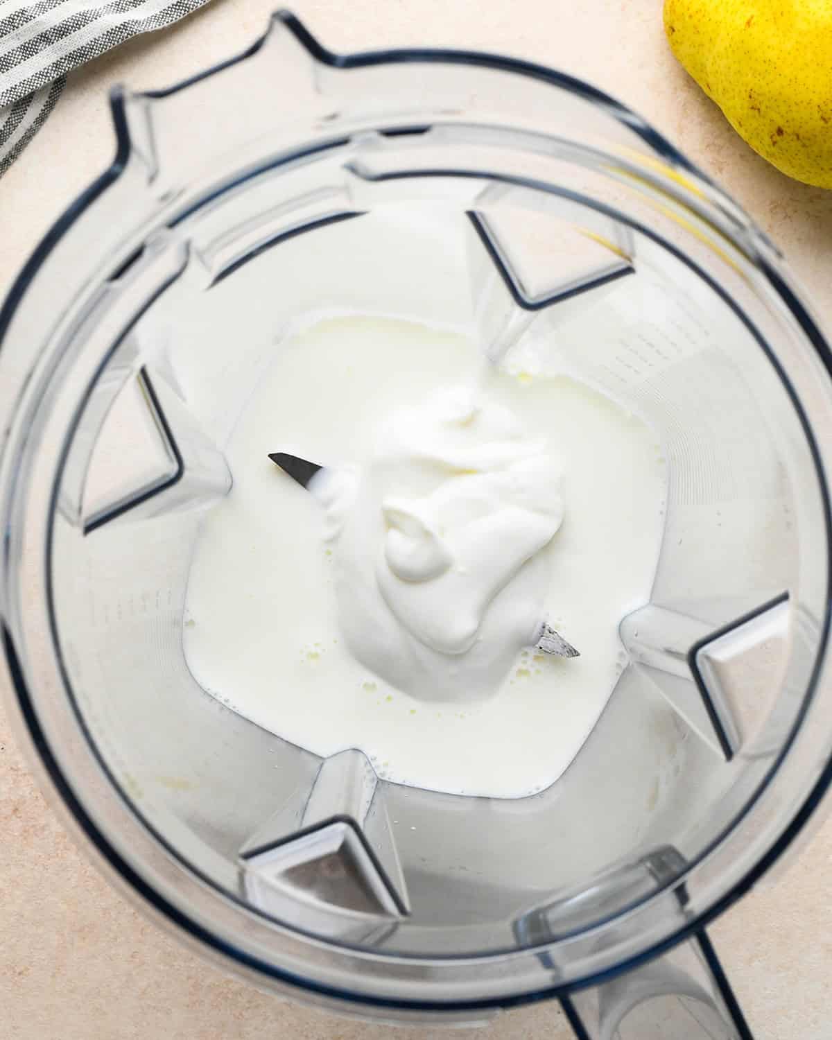 milk and yogurt in a blending container