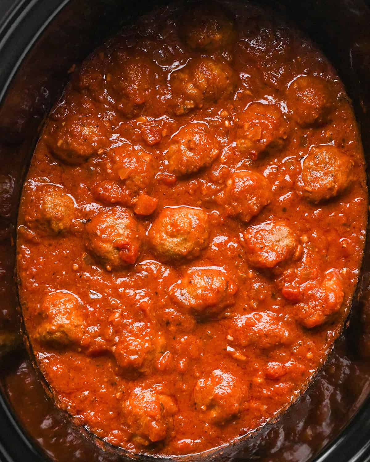 crock pot meatballs and sauce in a slow cooker after cooking