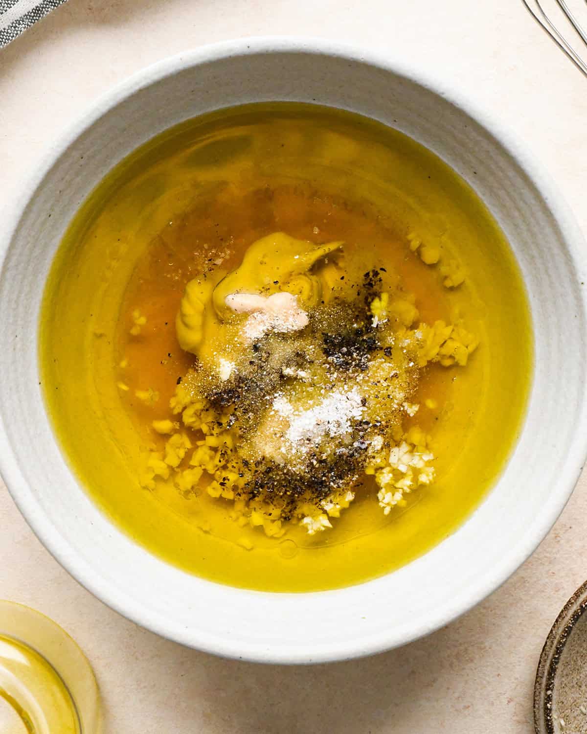 making Apple Salad - dressing ingredients in a small bowl before mixing