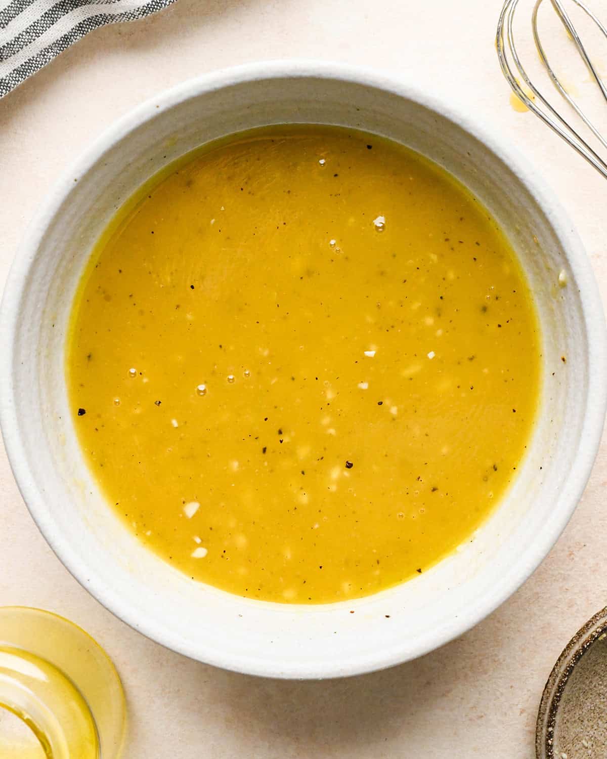 making Apple Salad - dressing mixed in a small bowl