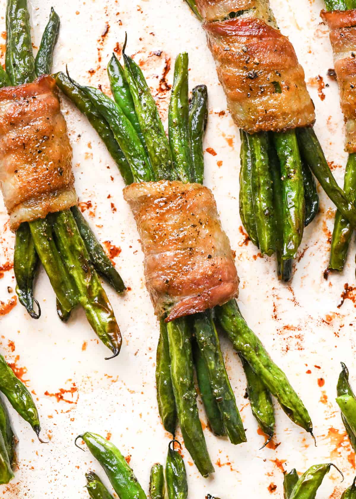up close photo of 3 bundles of Bacon Wrapped Green Beans