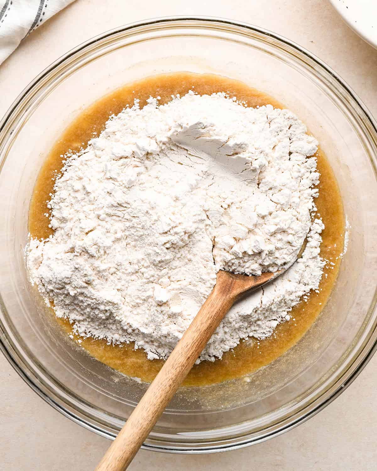 making banana crumb muffins - dry ingredients added to wet before mixing