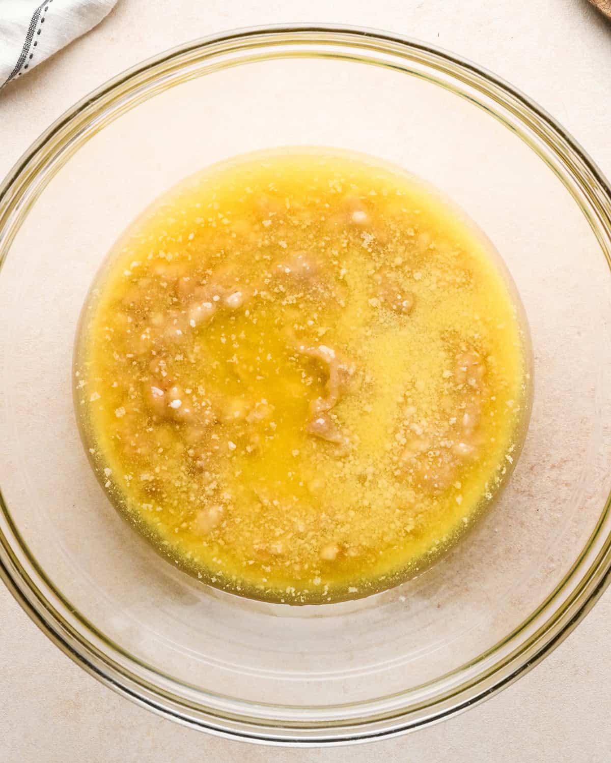 making banana crumb muffins - melted butter and banana in a bowl before mixing