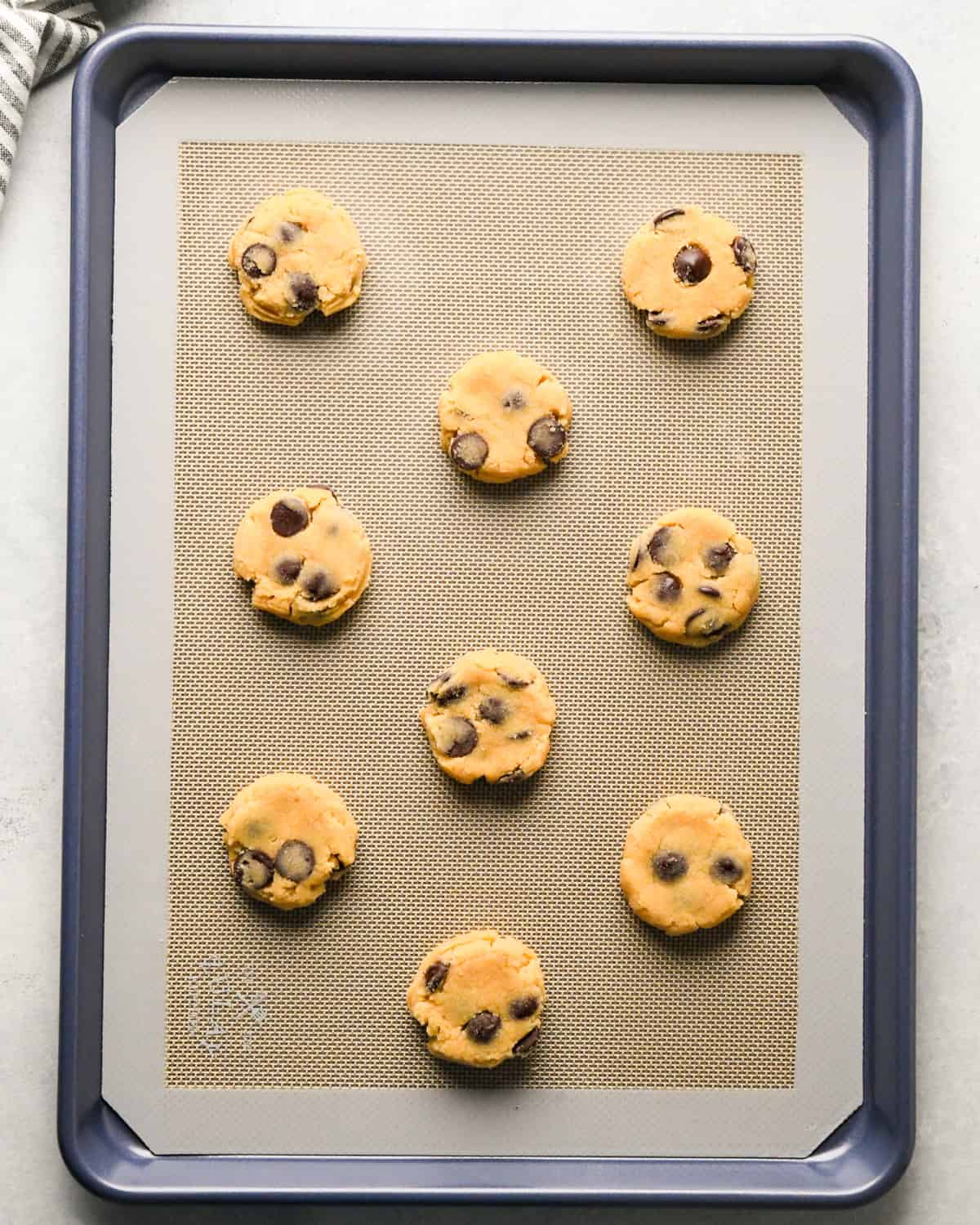 9 Coconut Flour Cookies on a baking sheet before baking
