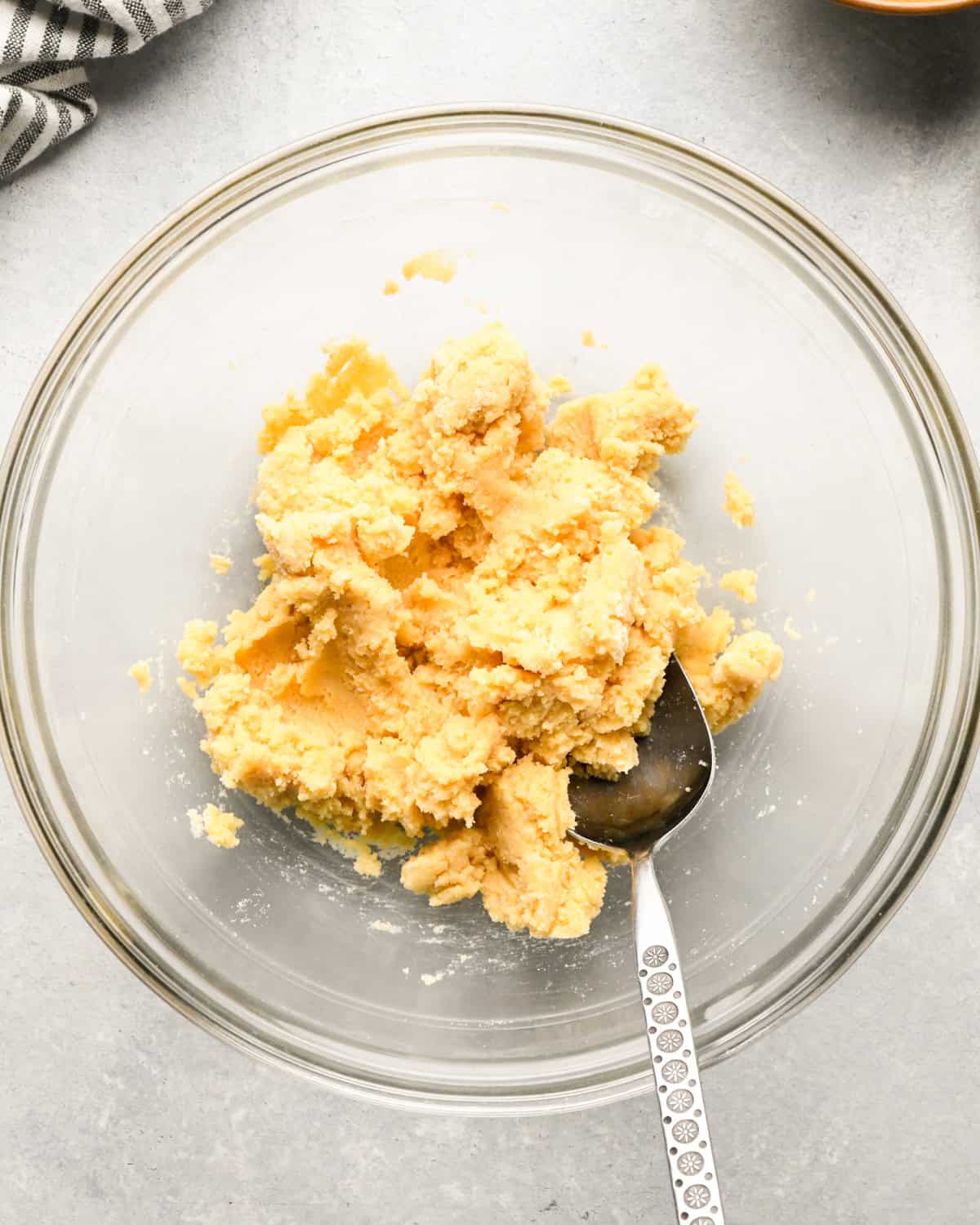 making Coconut Flour Cookies - dough in a bowl with a spoon