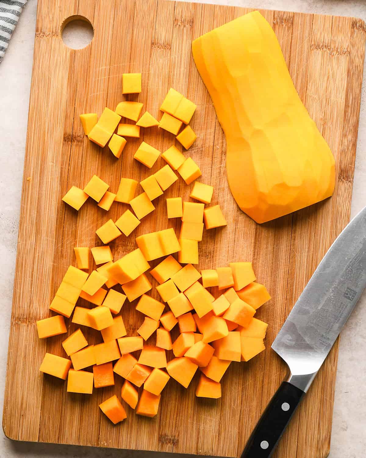 Making butternut squash risotto - dicing the butternut squash