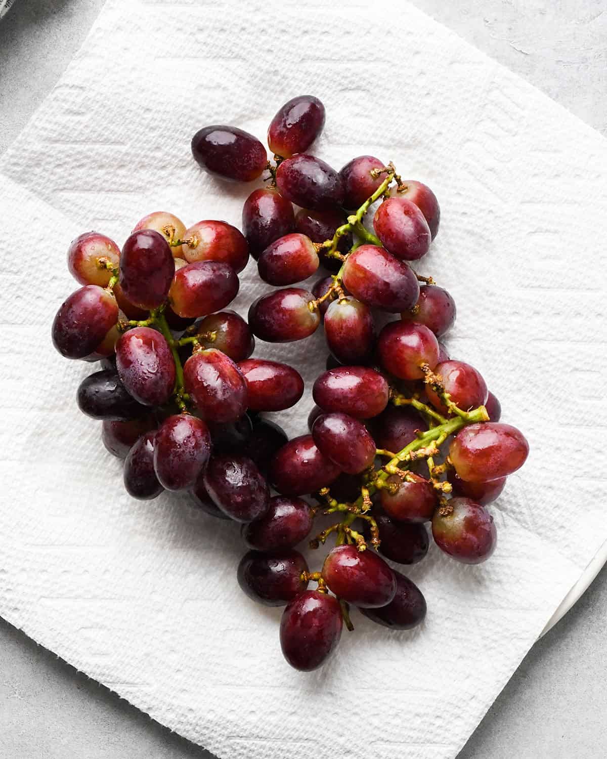 How to Make a Charcuterie Board - red grapes drying on a paper towel