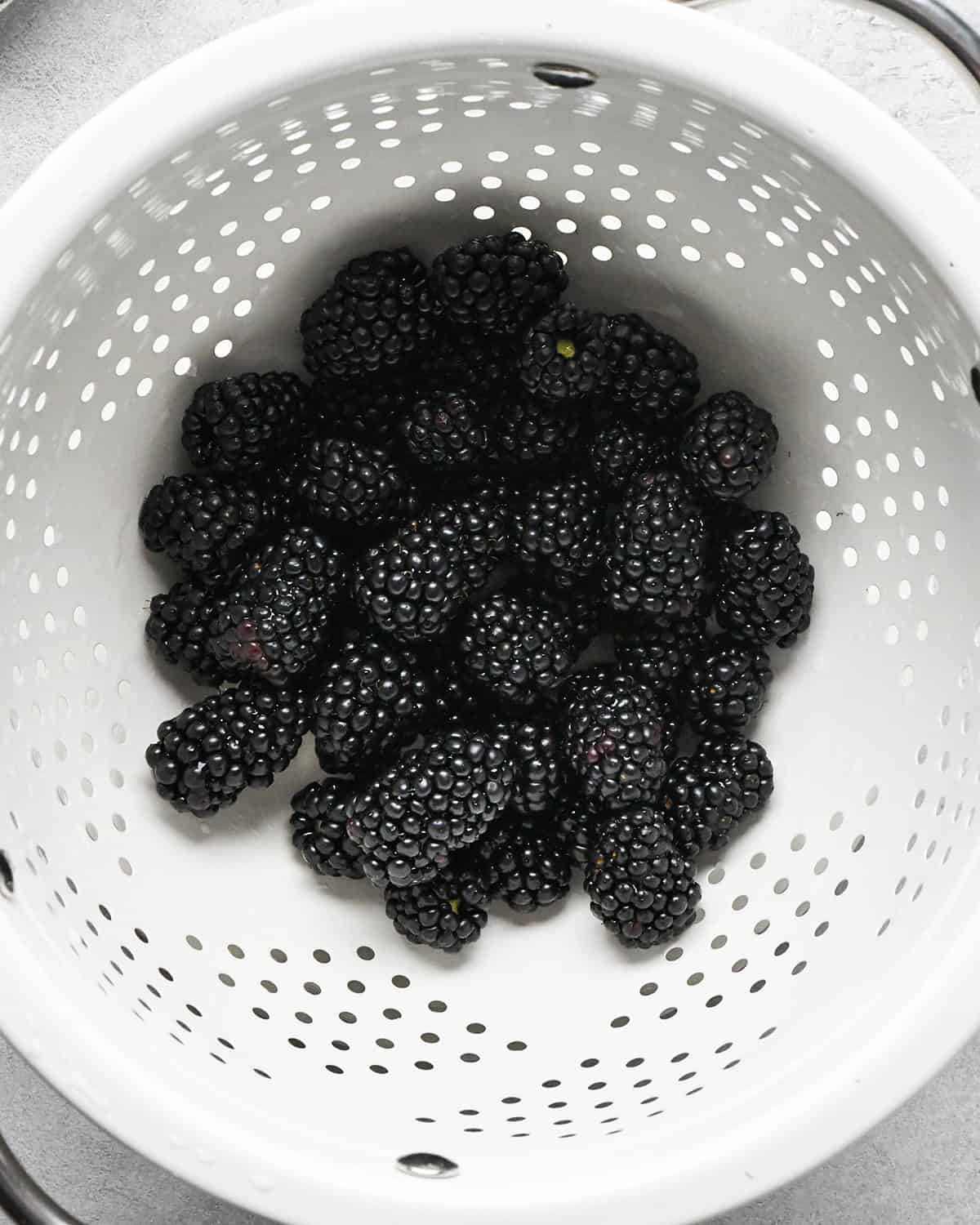 How to Make a Charcuterie Board - blackberries in a colander