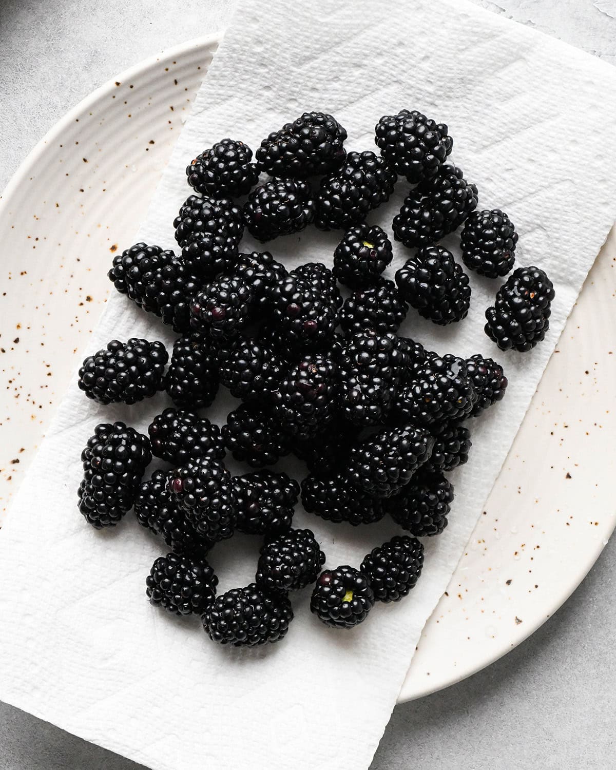 How to Make a Charcuterie Board - blackberries drying on a paper towel