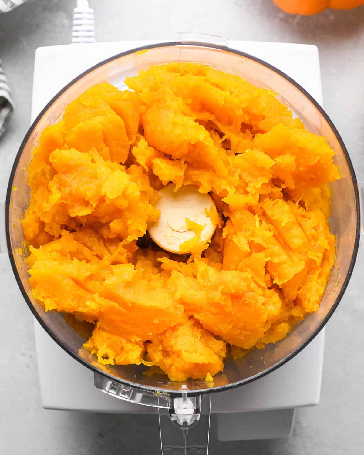 How to Make Pumpkin Puree - pumpkin pulp in a food processor before processing