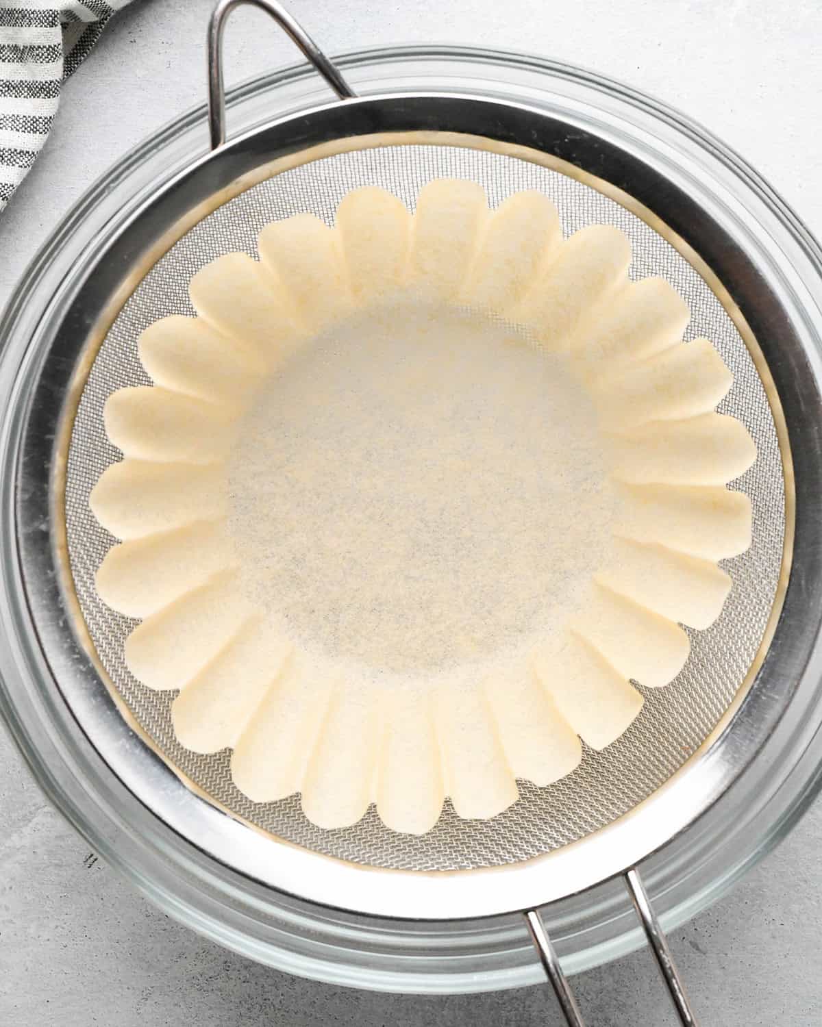 How to Make Pumpkin Puree - a fine mesh strainer with a coffee filter in it