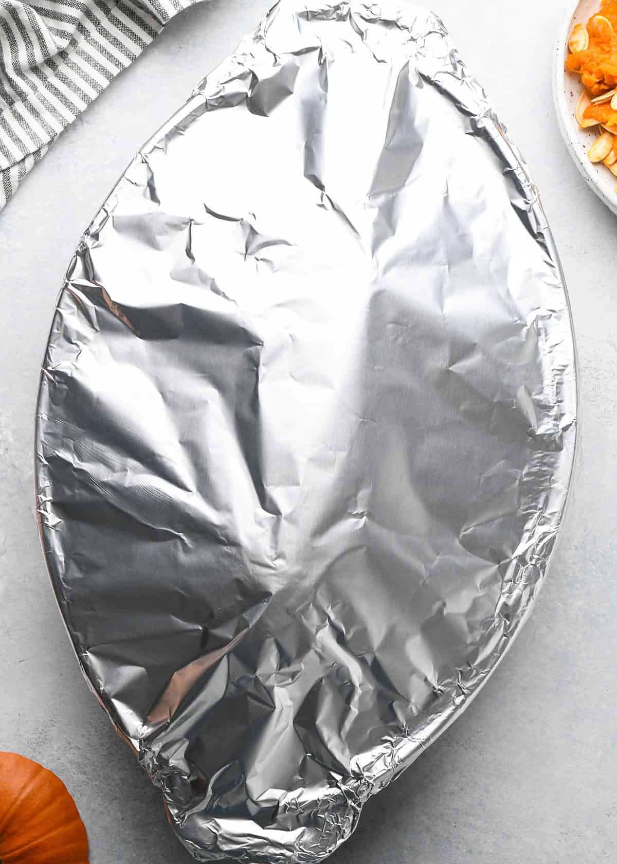 How to Make Pumpkin Puree - baking dish covered in foil