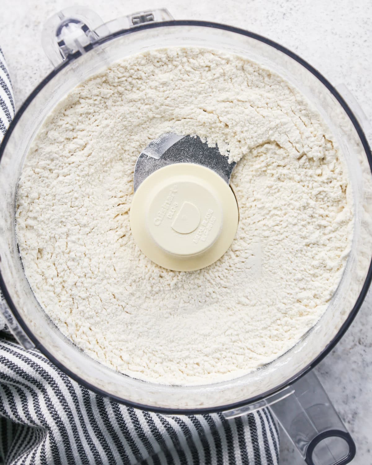 flour, salt and sugar in a food processor after mixing making pie crust cookies