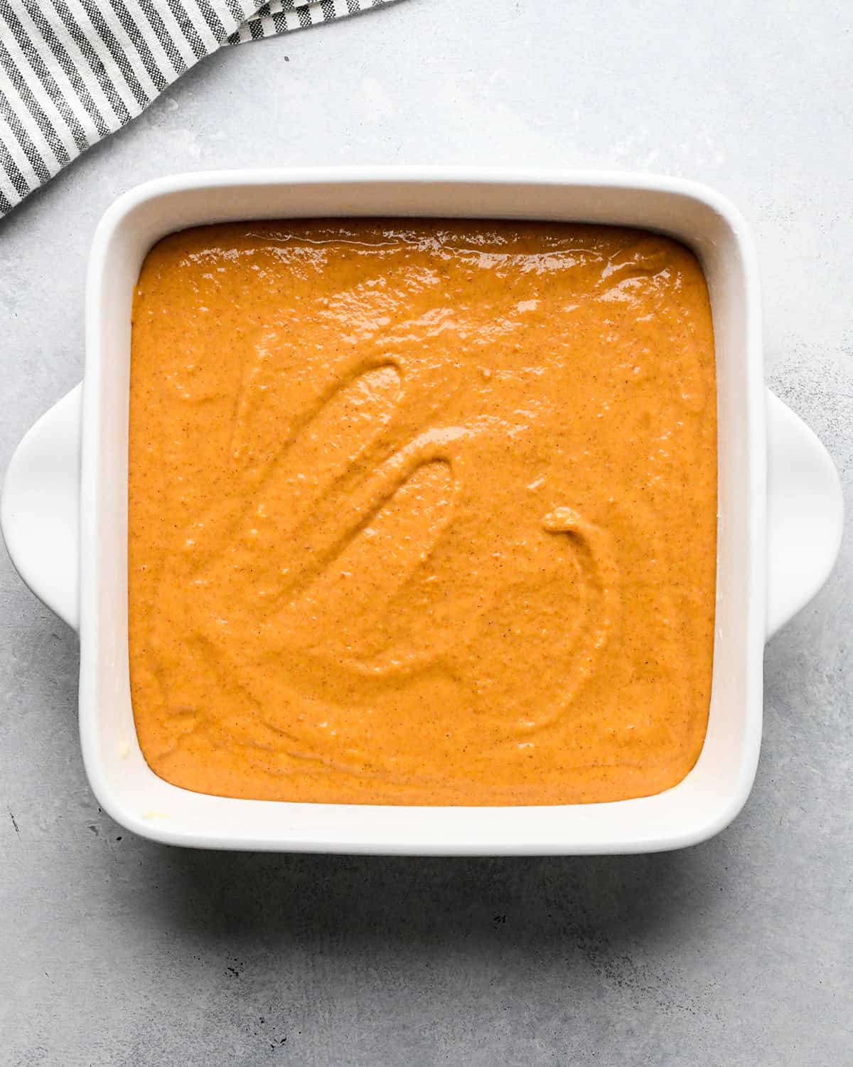 Pumpkin Coffee Cake batter in a baking dish before baking