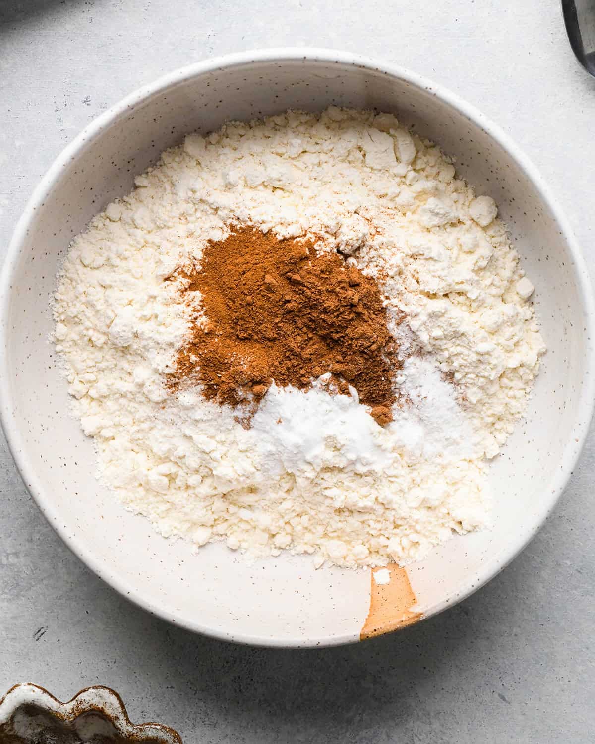 making Pumpkin Coffee Cake - dry ingredients in a bowl before mixing