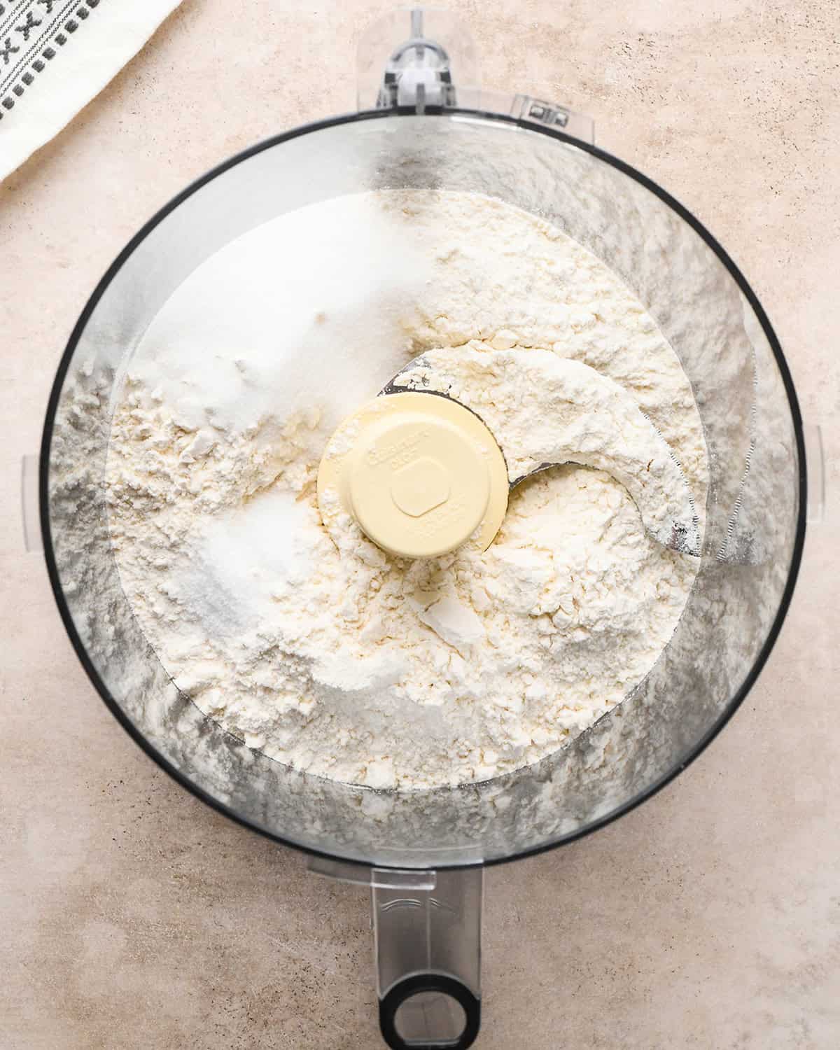 flour sugar and salt in a food processor before mixing making dutch apple pie crust