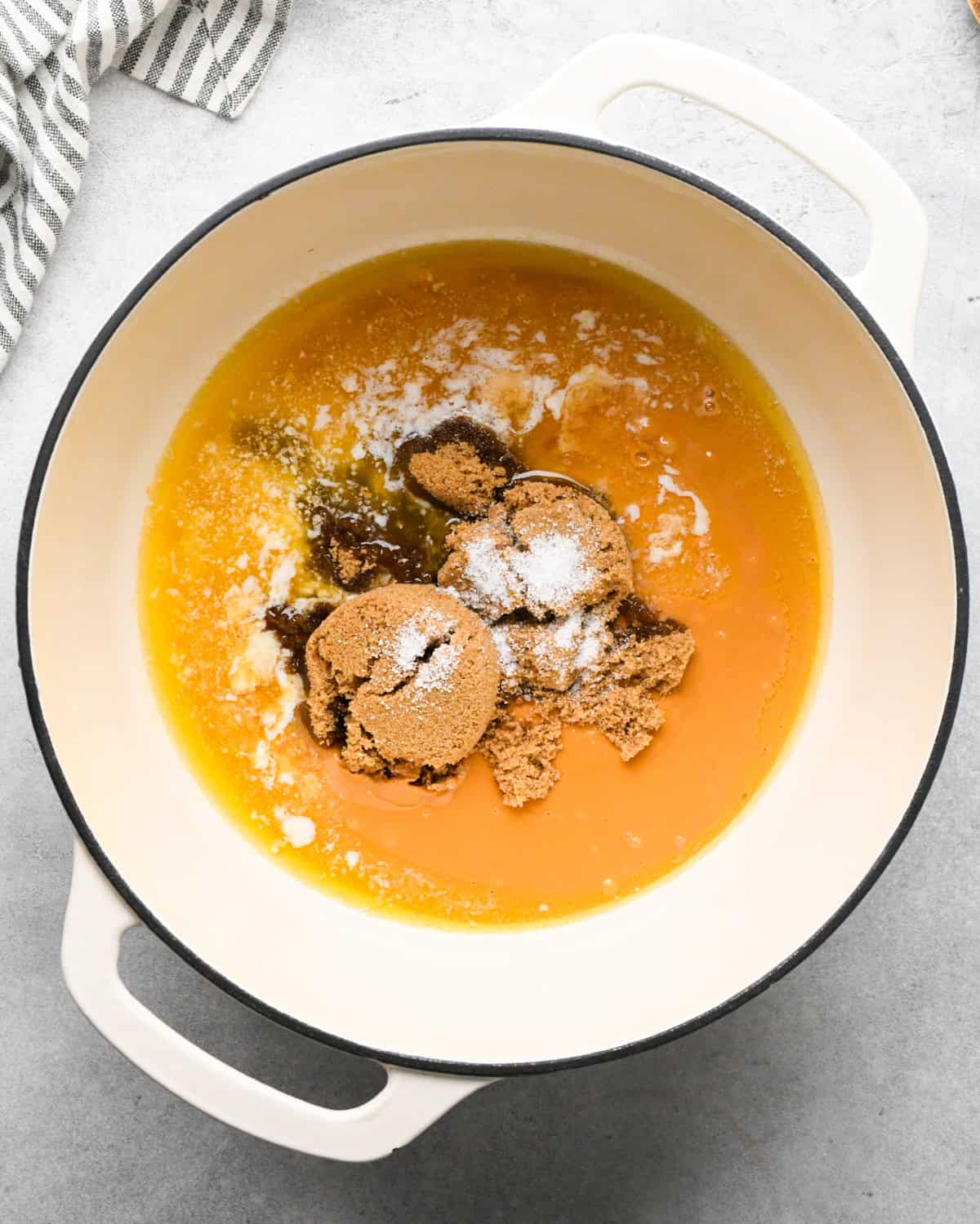 Making peanut butter oatmeal bars - overhead photo of butter, peanut butter, sea salt, and brown sugar in a pot.
