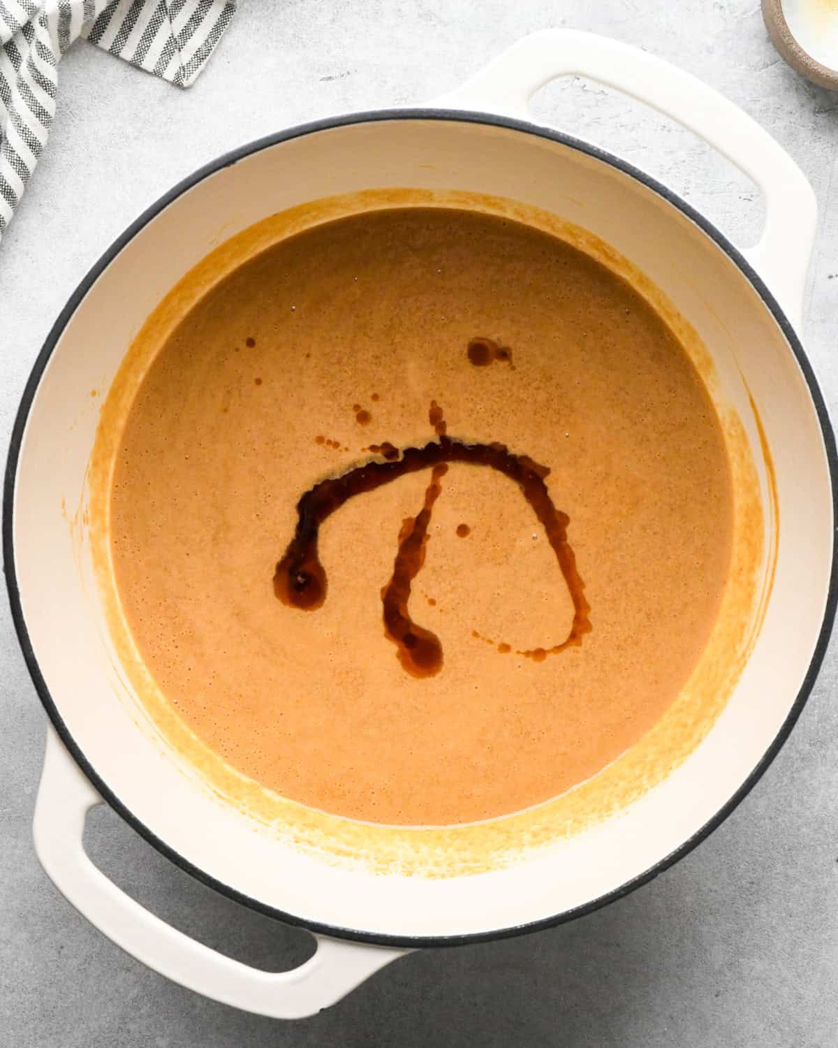 Making peanut butter oatmeal bars - overhead photo of butter, peanut butter, sea salt, brown sugar, and vanilla in a pot.