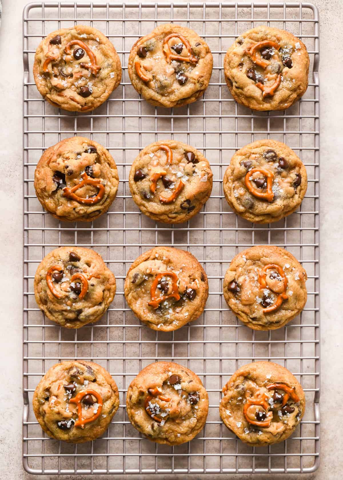 Making kitchen sink cookies - overhead photo of kitchen sink cookies cooling on a cooling rack.