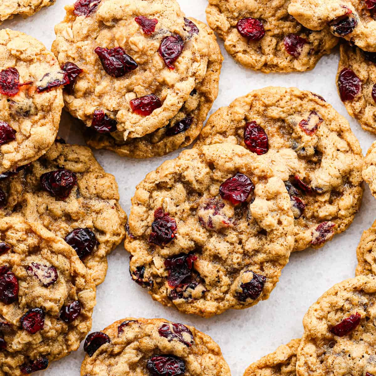 Overhead photo of a batch of cranberry oatmeal cookies.