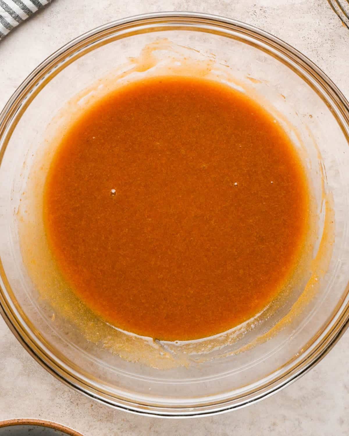 making brown butter pumpkin cookies - whisked wet ingredient mixture in a glass mixing bowl