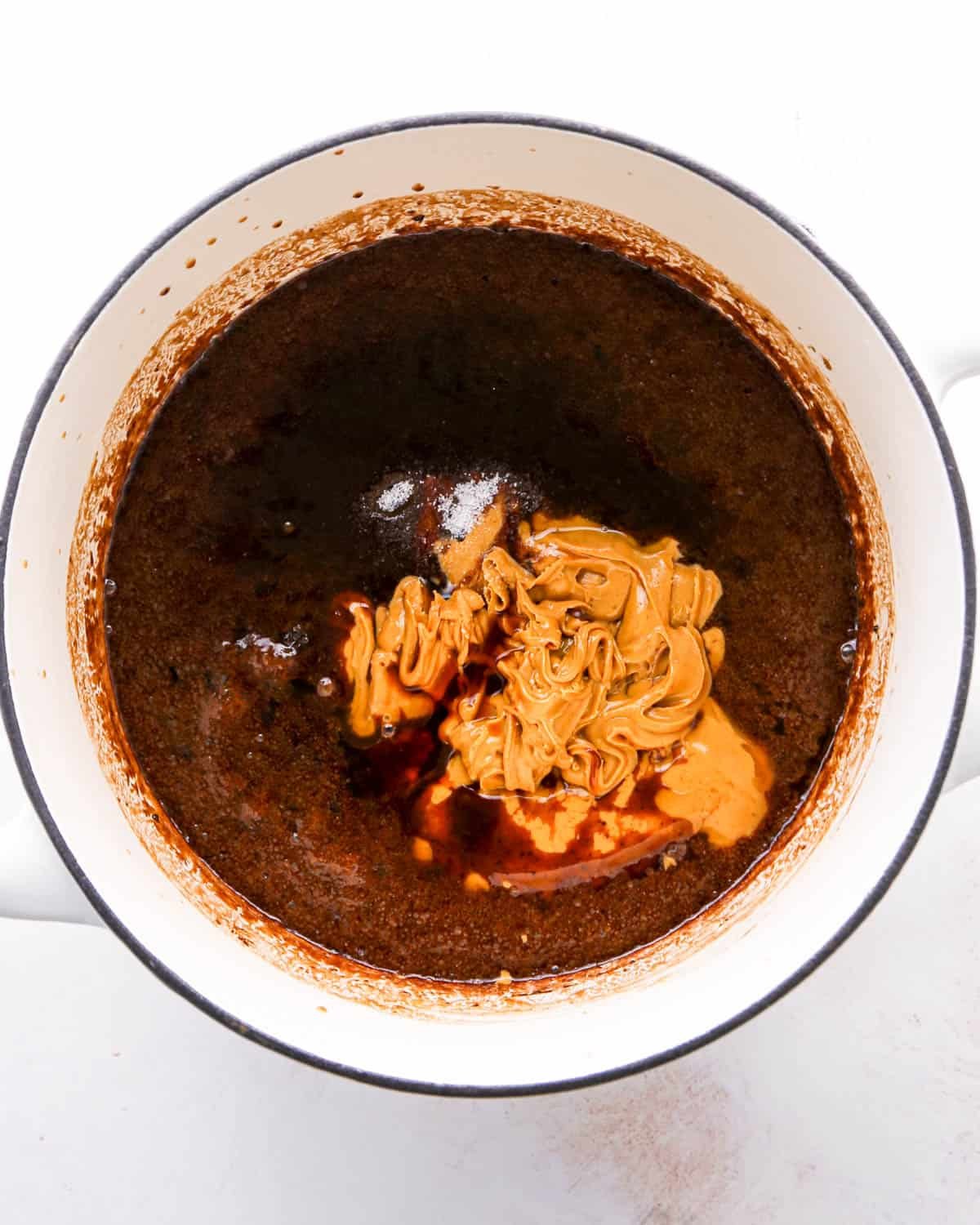 making birds nest cookies - adding peanut butter, vanilla and salt