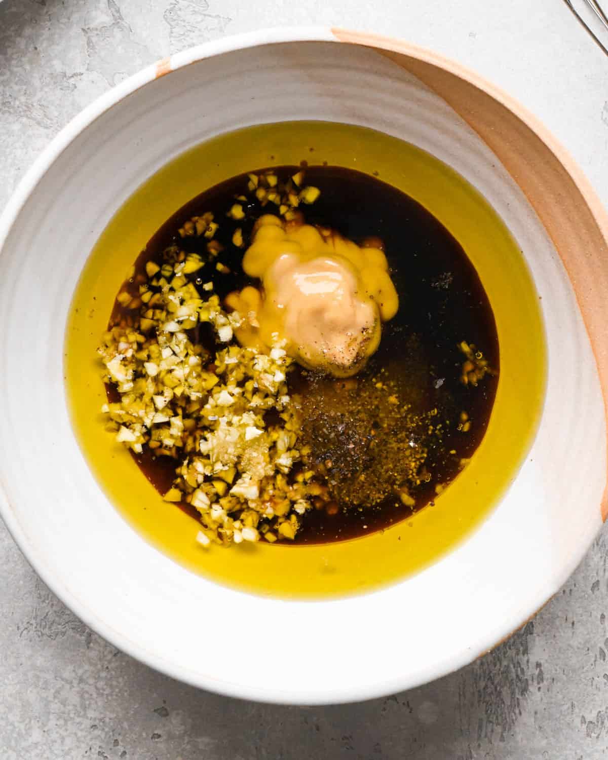 how to make pear salad - dressing ingredients in a small bowl before whisking