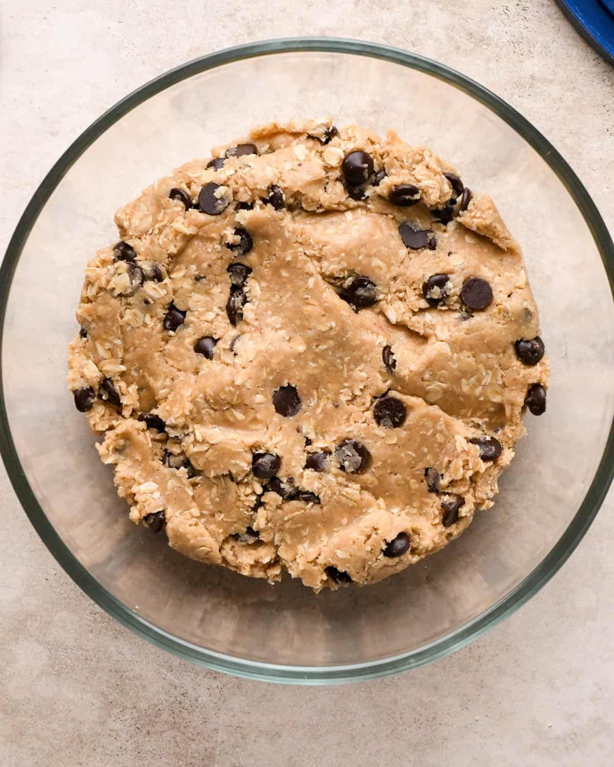 vegan oatmeal cookies dough in a glass bowl