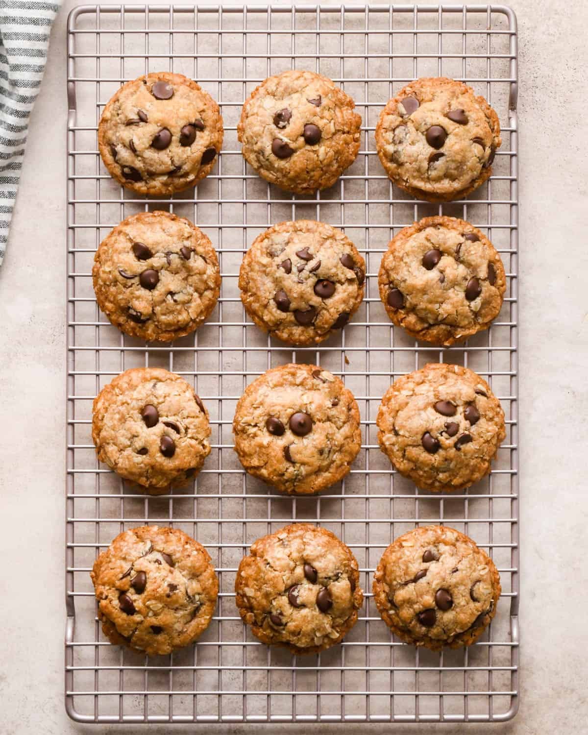 12 vegan oatmeal cookies on a wire cooling rack