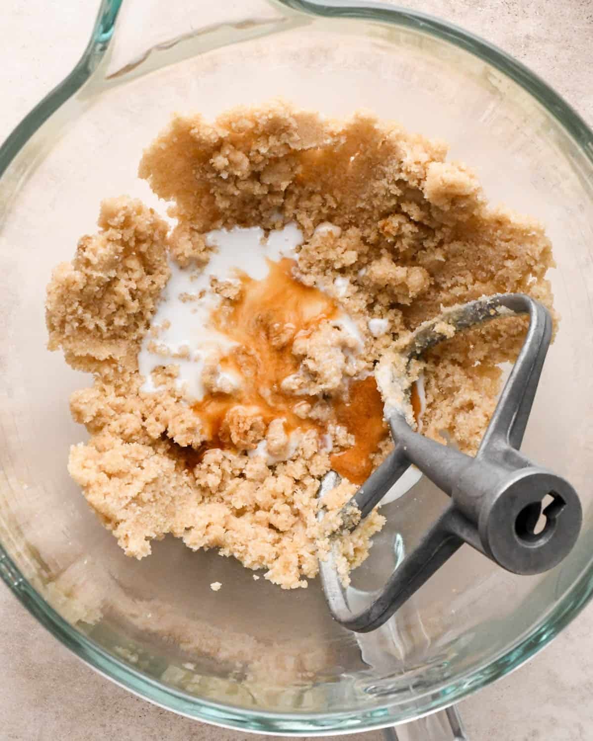 making vegan oatmeal cookies - coconut milk and vanilla added to the dough before beating