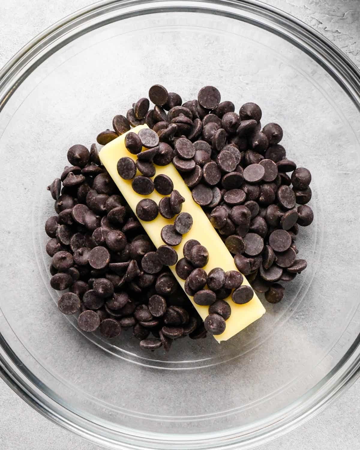 Making buckeye brownies: overhead photo of butter and chocolate chips in a small bowl.