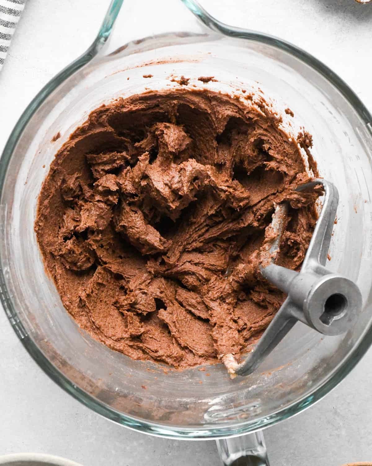 How to Make Chocolate Oatmeal Cookies - dough in a glass mixing bowl with the paddle attachment