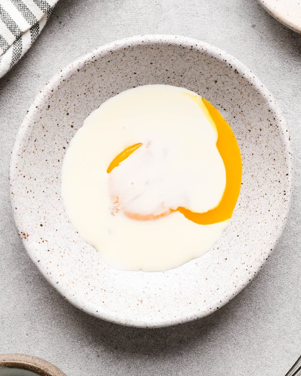 making homemade pop tarts - egg and milk in a bowl before mixing