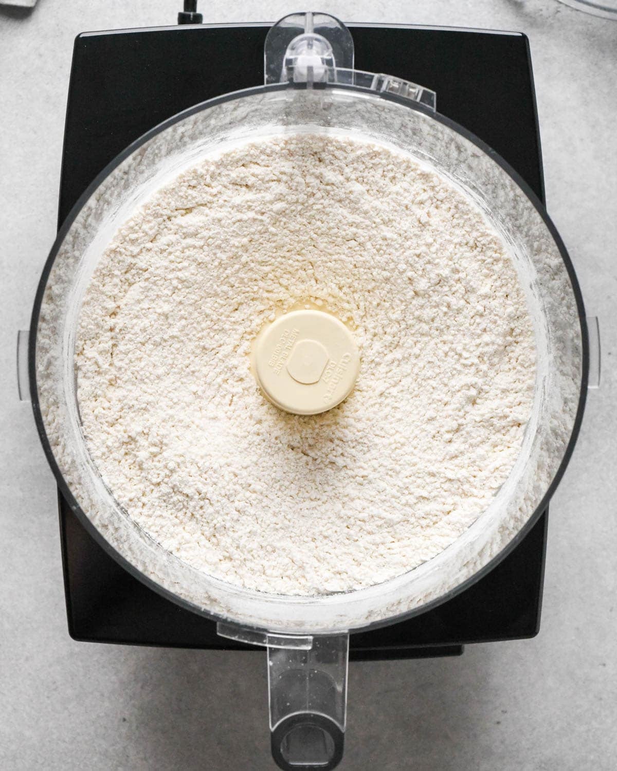 making homemade pop tarts - flour salt and sugar in the container of a food processor fitted with the "S" blade after mixing