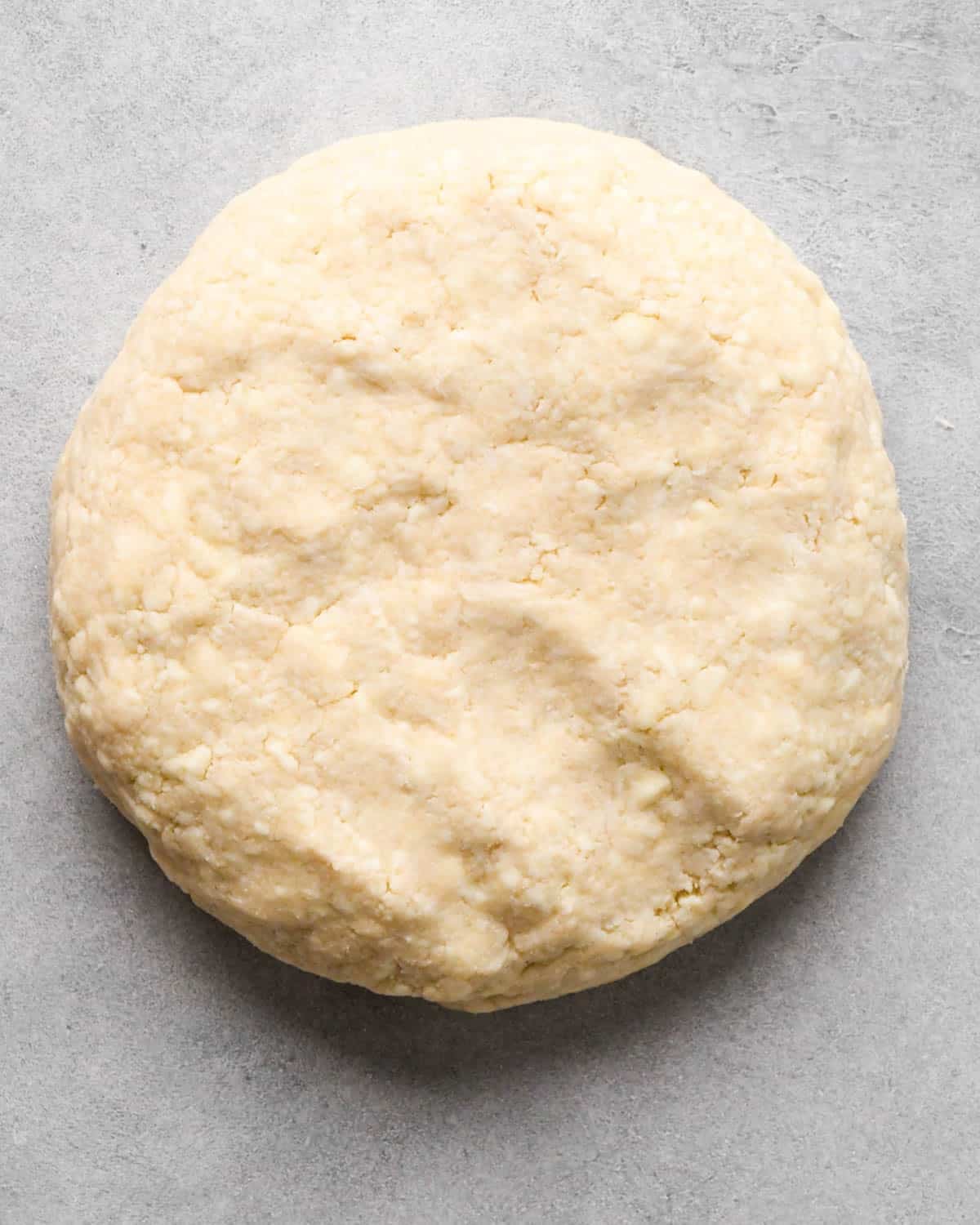making homemade pop tarts - dough formed into a round disc