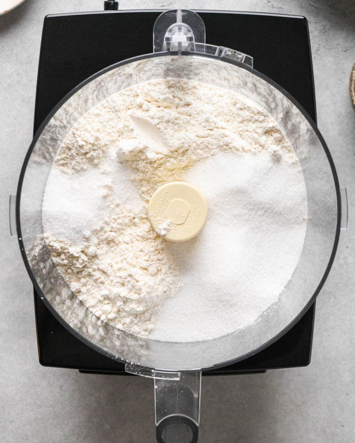 making homemade pop tarts - flour salt and sugar in the container of a food processor fitted with the "S" blade before mixing