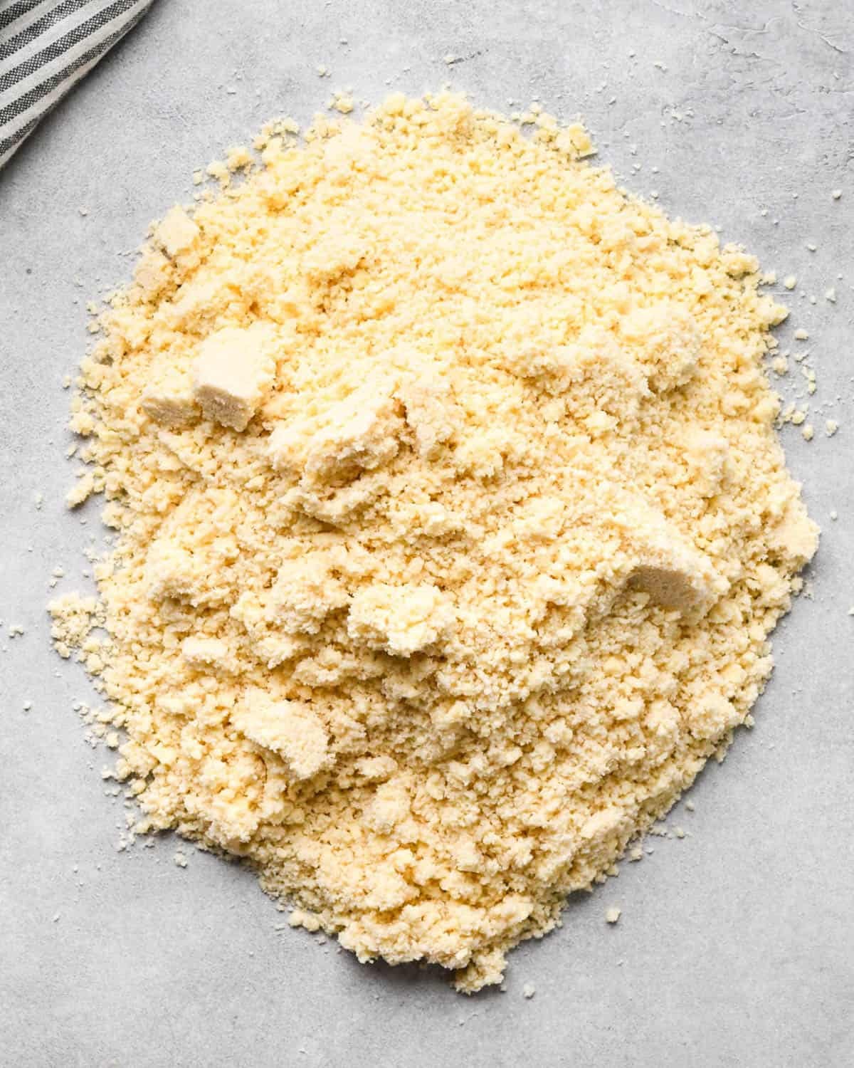 making apple hand pies crust - dough on a gray surface