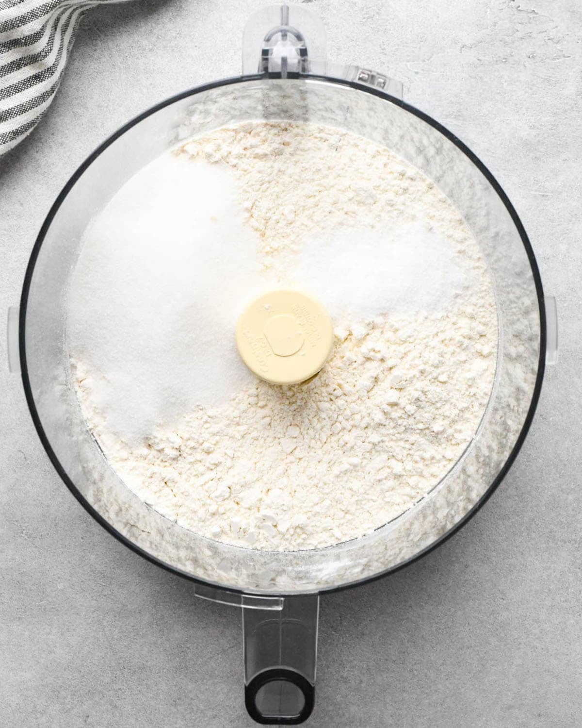 making apple hand pies crust - flour, salt and sugar in a food processor fitted with the "S" attachment before mixing