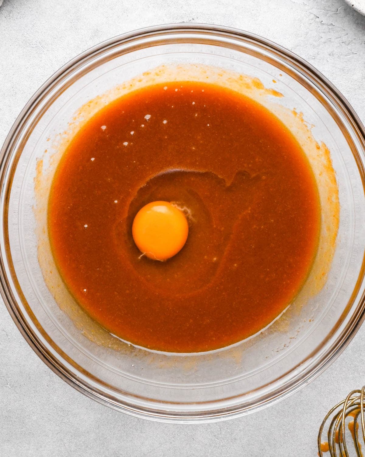 making pumpkin blondies - egg added to the wet ingredients before mixing